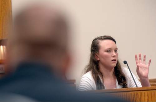 Al Hartmann |  The Salt Lake Tribune
Meagan Grunwald takes the witness stand in her own defense Wednesday, May 6, 2015, in Judge Darold McDade's courtroom in Provo. She is charged as an accomplice in a shooting spree that killed one police officer and wounded another on Jan. 30, 2014.