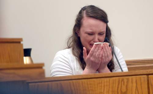 Al Hartmann |  The Salt Lake Tribune
Meagan Grunwald begins to cry as she takes the witness stand in her own defense Wednesday May 6, 2015, in Judge Darold McDade's courtroom in Provo. She is charged as an accomplice in a shooting spree that killed one police officer and wounded another on Jan. 30, 2014.
