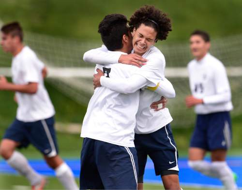 Scott Sommerdorf   |  The Salt Lake Tribune
American Leadership Academy's Juve Almanza celebrates with team mate Mahonry Chichia after Almanza  scored ALA's third goal of the first half as ALA defeated Manti 4-0 in a 3A semi-final played at Juan Diego High, Friday, May 8, 2015.