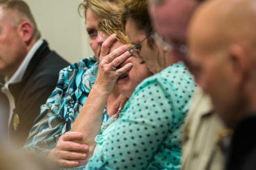 Chris Detrick  |  The Salt Lake Tribune
Tori Grunwald reacts as the guilty verdict is read for her daughter Meagan Grunwald at 4th District Court in Provo Saturday May 9, 2015. Eighteen-year-old Meagan Dakota Grunwald has been found guilty of 11 of 12 charges, including aggravated murder and attempted aggravated murder, for her role in a 2014 crime spree that left one officer dead and another wounded. She faces up to life in prison. She will be sentenced July 8.