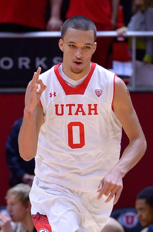 Leah Hogsten  |  The Salt Lake Tribune
Utah Utes forward Brekkott Chapman (0) throws up a three-pointer. The University of Utah men's basketball team leads the South Dakota State Jackrabbits, 45-28, Tuesday, December 23, 2014 at the Jon M. Huntsman Center.