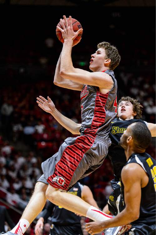 Trent Nelson  |  The Salt Lake Tribune
Utah Utes forward Jakob Poeltl (42) shoots the ball as the University of Utah Utes host the Wichita State Shockers, college basketball at the Huntsman Center in Salt Lake City, Wednesday December 3, 2014.