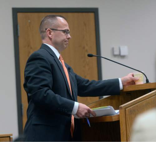 Al Hartmann |  The Salt Lake Tribune
Utah County prosecuter Tim Taylor gives the state's final rebutal in closing arguments Friday May 8 in the Meagan Grunwald trial in Provo. Grunwald is charged as an accomplice in a shooting spree that killed one police officer and wounded another on January 30, 2014.
