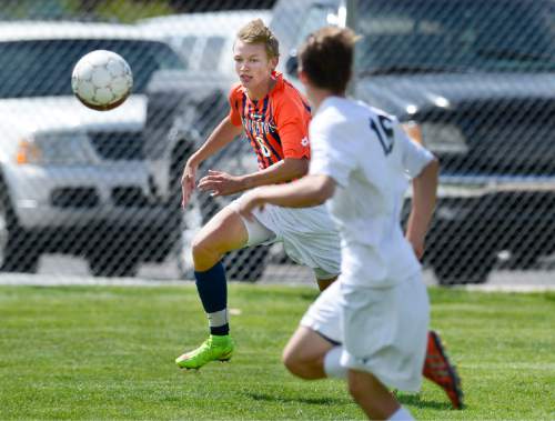 Scott Sommerdorf   |  The Salt Lake Tribune
Brighton's Kade Peterson chases down the ball during first half play as Alta beat Brighton 3-0 at Alta High, Thursday, May 7, 2015.