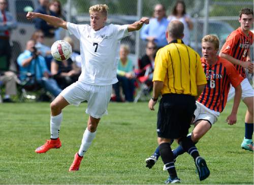 Scott Sommerdorf   |  The Salt Lake Tribune
Alta's Daniel Tree settles the ball after taking a pass during first half play. Defending for Brighton is Andrew Peterson. Alta beat Brighton 3-0 at Alta High, Thursday, May 7, 2015.