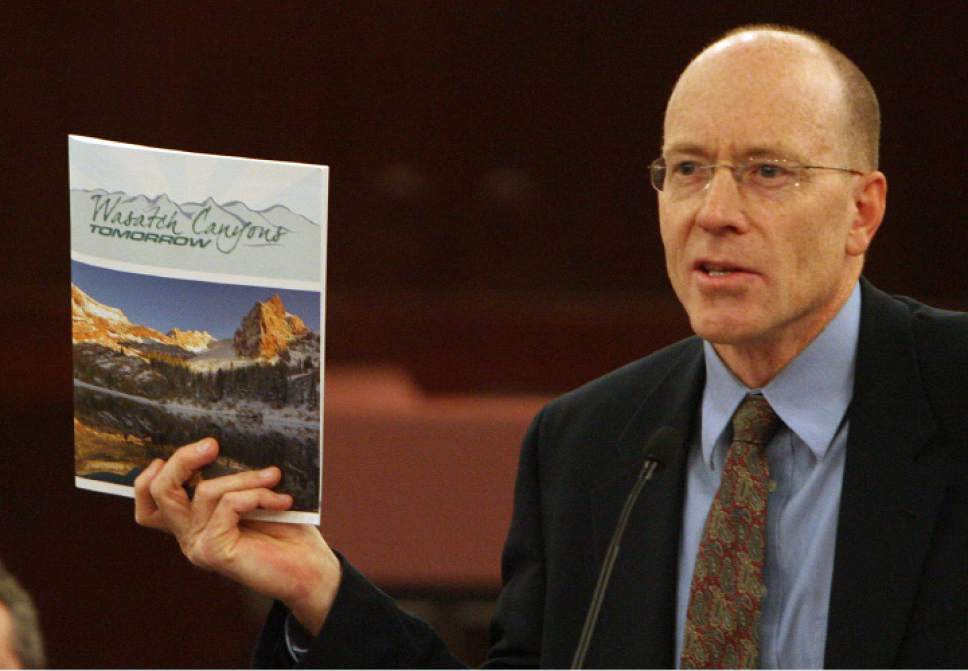 Steve Griffin | Tribune file photo

Alan Matheson holds up a copy of Wasatch Canyons Tomorrow's recommendations during a press conference at the Salt Lake County Council Chambers in Salt Lake City Monday, March 3, 2015. Matheson was appointed director of the Utah Department of Environmental Quality on Monday May 11, 2015.