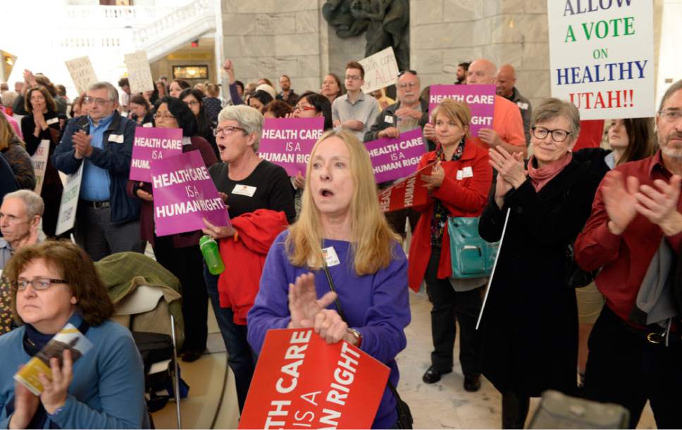 Al Hartmann  |  The Salt Lake Tribune 
The Utah Health Policy Project, hundreds of citizens and advocates of the governor's plan to expand Medicaid, Healthy Utah rally at noon Thursday March 5, 2015, inside the Capitol rotunda.