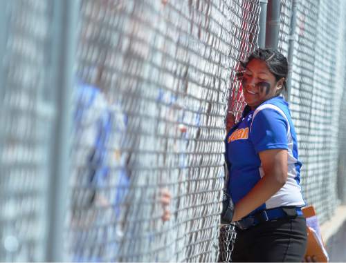 Steve Griffin  |  The Salt Lake Tribune


San Juan first baseman, Leilani Begaye, crashes into the dugout fence as she tries to catch a foul pop fly during high school 2A softball championship game against  South Summit at the Spanish Fork Complex in Spanish Fork, Monday, May 11, 2015.
