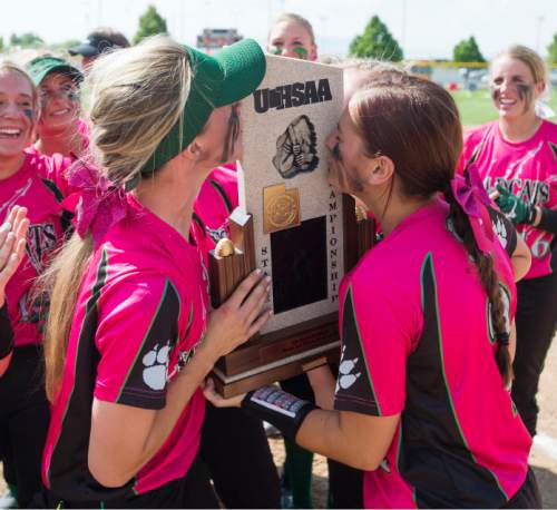 Steve Griffin  |  The Salt Lake Tribune


South Summit seniors Sidney Vidrine, left, and McKay Woolstenhulme  kiss the state championship trophy as they celebrate with her teammates after defeating San Juan twice giving them the 2A high school softball championship at the Spanish Fork Complex in Spanish Fork, Monday, May 11, 2015.