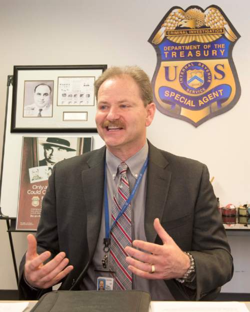 Rick Egan  |  The Salt Lake Tribune

Mike Brock, IRS Criminal Investigation assistant special agent in charge, discusses some of the recent criminal tax and money laundering cases in Utah, at the IRS office, Friday, April 10, 2015.