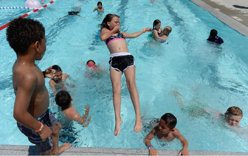 Francisco Kjolseth  |  The Salt Lake Tribune
The Salt Lake County Health Department holds its annual healthy swimming season media kickoff as kids play at the Redwood Recreation Center in West Valley City to remind residents to practice healthy swimming behaviors, especially implementing good hygiene habits and not visiting the pool while ill with diarrhea.