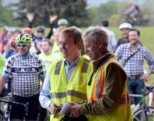 Al Hartmann |  The Salt Lake Tribune
Salt Lake County Mayor Ben McAdams, left, and Salt Lake City Mayor Ralph Becker join up with Salt Lake County's Bicycle Ambassadors and citizens at "The Draw" in Sugar House Park Tuesday May 12, 2015, to commute for this year's Mayor's Bike to Work Day. The Bicycle Ambassador program is one of a number of initiatives that Salt Lake County is working on to promote greater connectivity throughout the valley for cyclists who use bike lanes to commute to work, families who use trails for recreation, and riders in between.