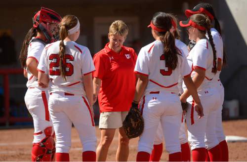 Leah Hogsten  |  The Salt Lake Tribune
Utah head coach Amy Hogue has a word with her players. The University of Utah softball team was defeated during their home debut, Saturday, by Oregon, 4-2, March 21, 2015 .