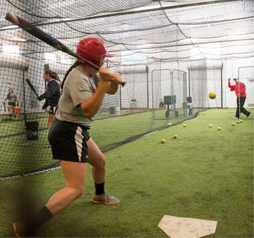 Rick Egan  |  The Salt Lake Tribune

Former USA Softball pitcher and Utah's pitching coach, Cody Thomson pitches batting practice to Hannah Flippen at the University of Utah, Wednesday, April 15, 2015.
