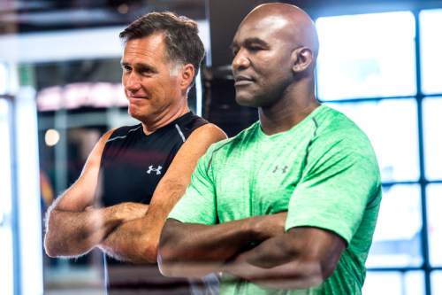 Chris Detrick  |  The Salt Lake Tribune
Mitt Romney and former heavyweight boxing champion Evander Holyfield square off before weighing in at Xcel Fitness Thursday May 14, 2015 .Romney will fight former heavyweight boxing champion Evander Holyfield in the marquee event Friday night at the Rail Event Center near the Union Pacific Depot in Salt Lake City on May 15.
