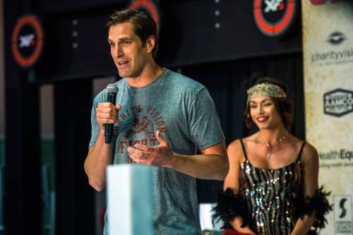 Chris Detrick  |  The Salt Lake Tribune
Josh Romney speaks at Xcel Fitness Thursday May 14, 2015. Romney will fight former heavyweight boxing champion Evander Holyfield in the marquee event Friday night at the Rail Event Center near the Union Pacific Depot in Salt Lake City on May 15.