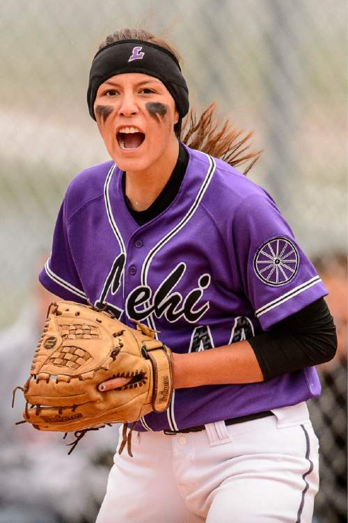 Trent Nelson  |  The Salt Lake Tribune
Lehi's Terra Tahbo yells after completing a solo double play during a 5A softball tournament second-round game between defending champion Lehi and No. 1 seed Taylorsville, Thursday May 14, 2015.