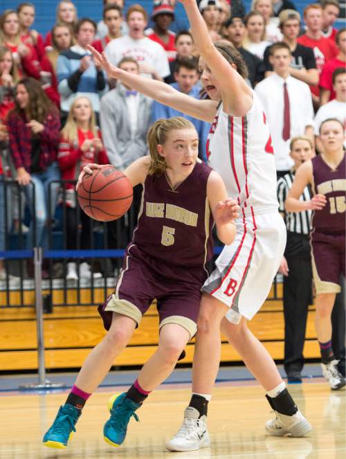 Rick Egan  |  The Salt Lake Tribune

Liz Eaton (5), Maple Mountain, tries to get past 	Kennedy Redding, Bountiful, in 4A State Girls Basketball Tournament action, Bountiful vs Maple Mountain, Thursday, February 19, 2015.