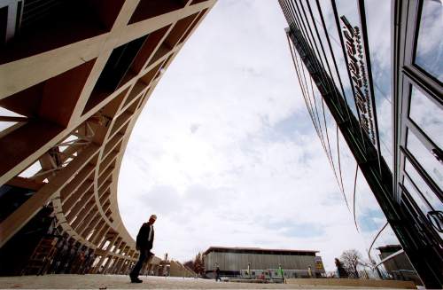 Steve Griffin  |  Tribune File Photo

The Salt Lake City Main Library in downtown Salt Lake CIty. Feb. 5, 2003. Pictured in the distance is the old library, which became The Leonardo.