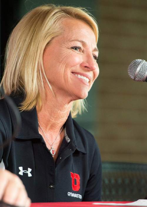 Rick Egan  |  The Salt Lake Tribune

Megan Marsden talks about her new position as a co-gymnastics coach with Tom Farden, at a news conference at the Huntsman Center, Tuesday, April 21, 2015.