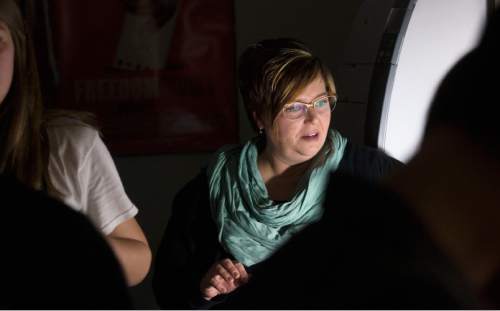 Steve Griffin  |  The Salt Lake Tribune

Wendy Frazier-Snyder, who is one of the KUED Teacher Innovators who will be honored at a banquet in May, works with her students during her digital photography class "Science" shooting lab at American Fork High School on  Monday, April 20, 2015.