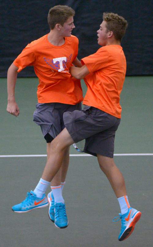 Leah Hogsten  |  The Salt Lake Tribune
l-r Travis Wardrop and Mason Brockbank of Timpview High Schoo took first place in the 4A State Championship Doubles title Saturday, May 16, 2015 at the George S. Eccles Tennis Center.