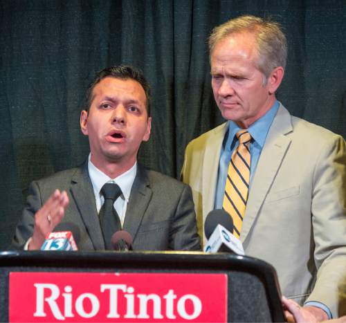Rick Egan  |  The Salt Lake Tribune

Rosemberg Salgado stands next to Ed Smart at a press conference as he pleads for help in the search for his niece, 26-year-old Elizabeth Elena Laguna-Salgado, who was last seen April 16. Friday, April 24, 2015.