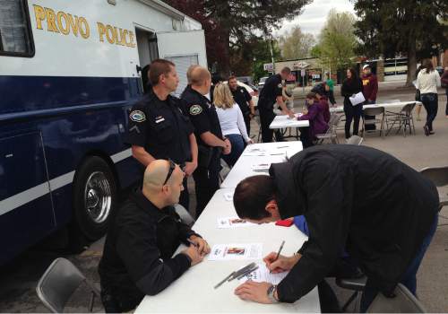 Scott Sommerdorf   |  Tribune file photo
Volunteers sign upin April to search for Provo resident  Elizabeth Elena Laguna-Salgado, 26, who was last seen walking home April 16 from the Nomen Global Language School at 384 W. Center St.
