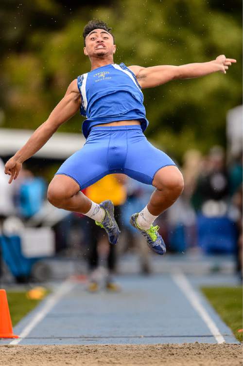 Trent Nelson  |  The Salt Lake Tribune
Cyprus's AJ Semeatu competes in the 4A long jump at the state high school track meet in Provo, Saturday May 16, 2015.