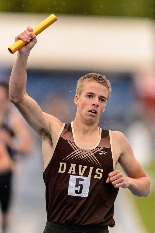 Trent Nelson  |  The Salt Lake Tribune
Davis's Logan MacKay celebrates victory in the 5A Medley at the state high school track meet in Provo, Saturday May 16, 2015.