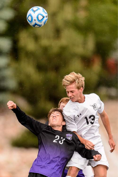 Trent Nelson  |  The Salt Lake Tribune
Lehi's Matthew Holt (23) and Alta's Colbey Morf, during the 5A boys' soccer semifinal with Alta vs. Lehi High School, in Woods Cross, Tuesday May 19, 2015.