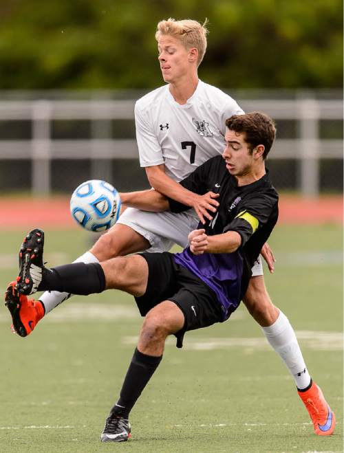 Trent Nelson  |  The Salt Lake Tribune
Alta's Daniel Tree and Lehi's Isaiah Altamirano (11), during the 5A boys' soccer semifinal with Alta vs. Lehi High School, in Woods Cross, Tuesday May 19, 2015.