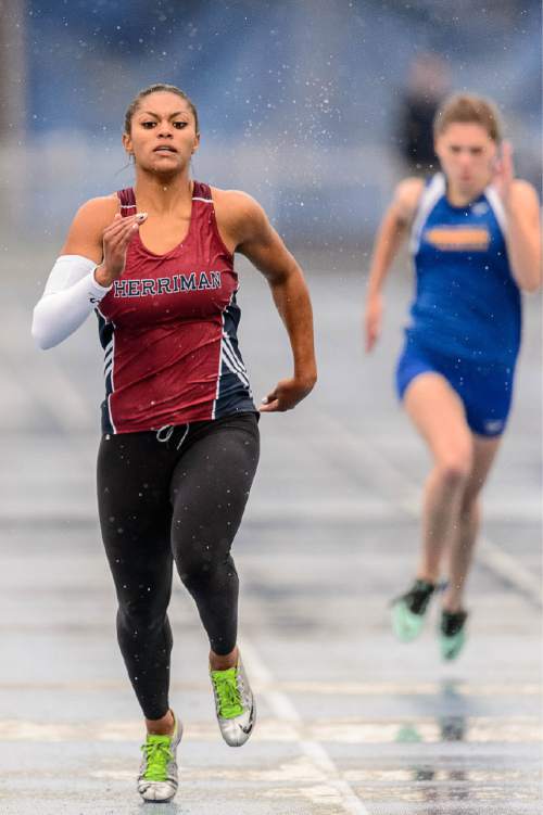 Trent Nelson  |  The Salt Lake Tribune
Herriman's Kaysha Love wins a heat of the 5A 200 meter race at the state high school track meet in Provo, Saturday May 16, 2015.