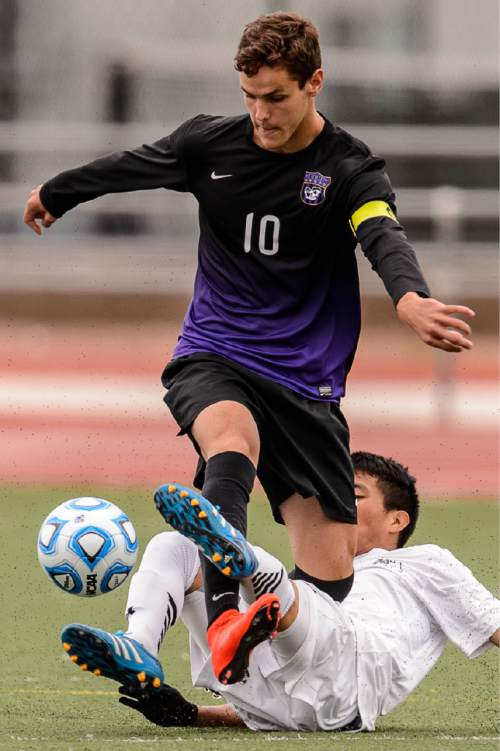 Trent Nelson  |  The Salt Lake Tribune
Lehi's Leonardo Fuchs (10) and Alta's Carlos Palomino tangle up during the 5A boys' soccer semifinal with Alta vs. Lehi High School, in Woods Cross, Tuesday May 19, 2015.