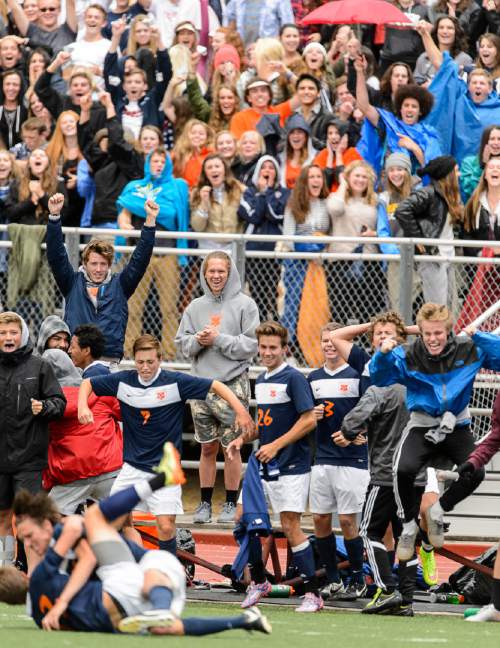 Trent Nelson  |  The Salt Lake Tribune
Brighton fans and players celebrate the game-winning goal by Douglas Regehr, during the Layton vs. Brighton High School, in Woods Cross, Tuesday May 19, 2015.
