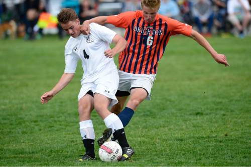 Scott Sommerdorf   |  The Salt Lake Tribune
Alta's Mitchell Fisher, and Brighton's Andrew Peterson battle for the ball during second half play. Alta beat Brighton 3-0 at Alta High, Thursday, May 7, 2015.