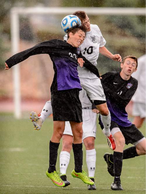Trent Nelson  |  The Salt Lake Tribune
Lehi's Matthew Holt (23) and Alta's Christian Bain head the ball during the 5A boys' soccer semifinal with Alta vs. Lehi High School, in Woods Cross, Tuesday May 19, 2015.