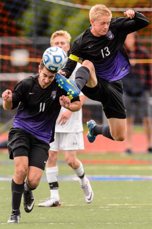 Trent Nelson  |  The Salt Lake Tribune
Lehi's Isaiah Altamirano (11) and Lehi's Josh Mortensen (13) collide during the 5A boys' soccer semifinal with Alta vs. Lehi High School, in Woods Cross, Tuesday May 19, 2015.