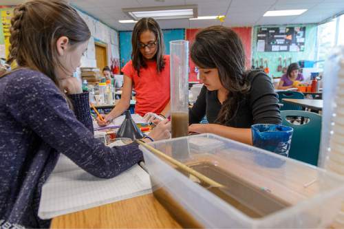 Trent Nelson  |  The Salt Lake Tribune
Molly Chien, Chayla Masina, and Esmeralda Urrea work on a science project at the Salt Lake Center for Science Education in Salt Lake City, Tuesday May 19, 2015.
