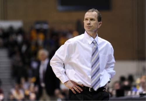 Weber State coach Randy Rahe looks on against Montana during the second half of an NCAA college basketball game in the semifinals of the Big Sky tournament Tuesday, March 8, 2011, in Greeley, Colo. Montana beat Weber State 57-40. (AP Photo/Jack Dempsey)