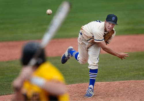 Scott Sommerdorf   |  The Salt Lake Tribune
Pleasant Grove starting pitcher Logan Carlson pitches during 3rd inning play. Pleasant Grove defeated Cottonwood 3-2 to win the winner's bracket final at UVU, and advance to the 5A final game, Thursday, May 21, 2015.