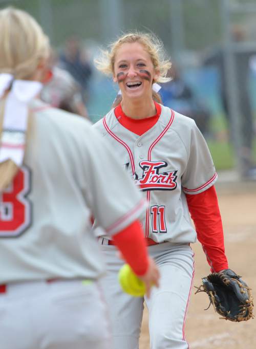 Leah Hogsten  |  The Salt Lake Tribune
Spanish Fork pitcher Cambrie Hazel celebrates the win with Kenzie Branch. Spanish Fork High School girls softball team defeated Springville High School 7-1 during their 4A state semifinal game Thursday, May 21, 2015 at the Taylorsville Valley Softball Complex.