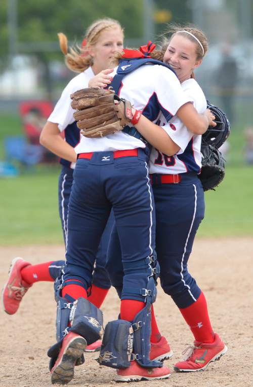 Leah Hogsten  |  The Salt Lake Tribune
Springville's catcher Natalie Sumsion thanks tam mate Teresa Morse for ending the 6th inning. Spanish Fork High School girls softball team defeated Springville High School 7-1 during their 4A state semifinal game Thursday, May 21, 2015 at the Taylorsville Valley Softball Complex.