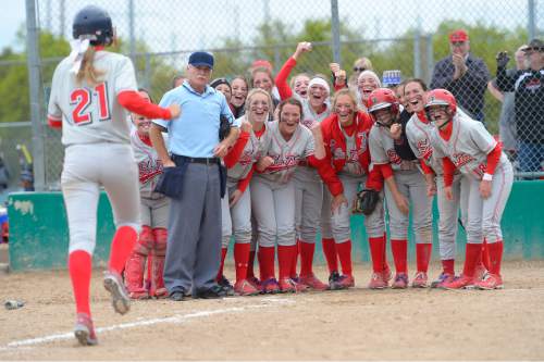 Leah Hogsten  |  The Salt Lake Tribune
Spanish Fork's Taylor Miller hits a home run in the 6th inning, bringing in runner Kaylee Bott. Spanish Fork High School girls softball team defeated Springville High School 7-1 during their 4A state semifinal game Thursday, May 21, 2015 at the Taylorsville Valley Softball Complex.