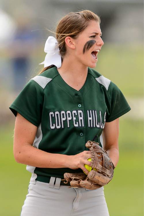 Trent Nelson  |  The Salt Lake Tribune
Copper Hills's Paige Watts (9) cheers on her team. Herriman vs. Copper Hills High School softball, in West Valley City, Thursday May 21, 2015.