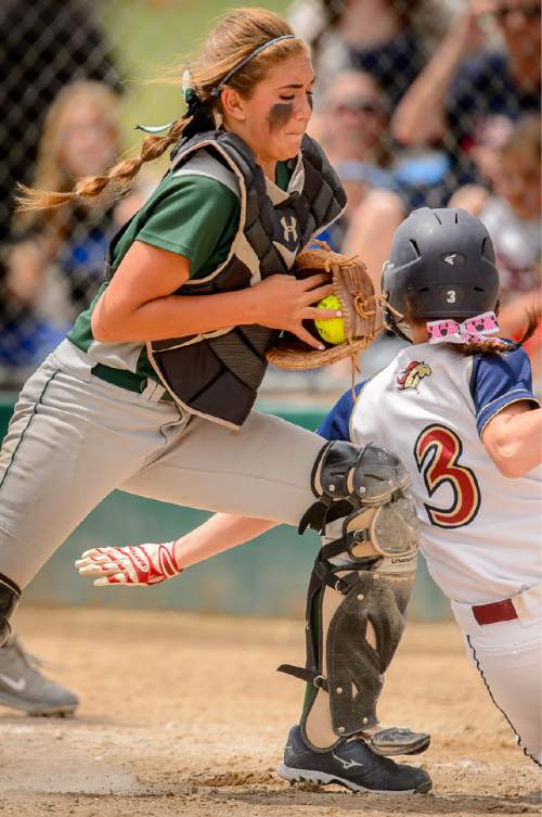 Trent Nelson  |  The Salt Lake Tribune
Copper Hills's Mikelle Magalogo (1) is just a moment late in tagging out Herriman's Allie Lloyd (3). Herriman vs. Copper Hills High School softball, in West Valley City, Thursday May 21, 2015.