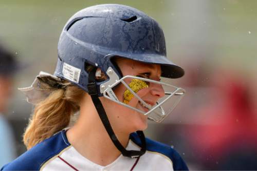 Trent Nelson  |  The Salt Lake Tribune
Herriman's Mikaela Thomson (23) smiles on third base after knocking in two runs. Herriman vs. Copper Hills High School softball, in West Valley City, Thursday May 21, 2015.