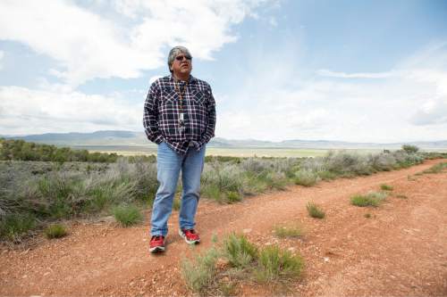 Rick Egan  |  The Salt Lake Tribune

Patrick Charles, who works as a jobs placement and training specialist for members of the Paiute Indian Tribe of Utah, walks on Paiute Tribal land near I-15 south of Cedar City, Wednesday, May 6, 2015.