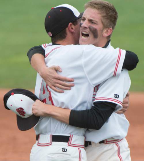 Rick Egan  |  The Salt Lake Tribune

Spanish Fork Dons Benson Rhees (4) hugs Tanner Nielsen (3) as they celebrate their 5-4 win over the Maple Mountain Golden Eagles, to win the in prep 4A state baseball title at Brent Brown field in Orem, Friday, May 22, 2015.