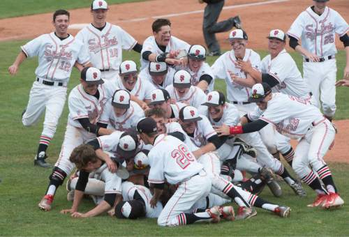 Rick Egan  |  The Salt Lake Tribune

The Spanish Fork Dons celebrate their 5-4 win over the Maple Mountain Golden Eagles, to win the in prep 4A state baseball title at Brent Brown field in Orem, Friday, May 22, 2015.